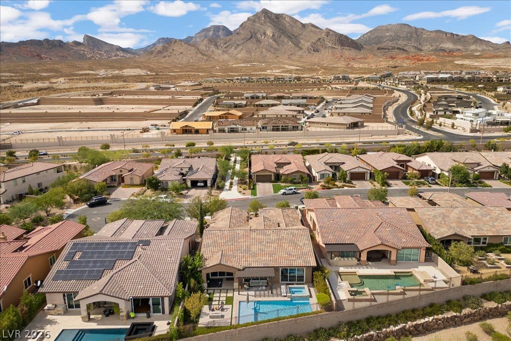286 Besame Court, Las Vegas, NV 89138 Dramatic mountain ranges provide an impressive backdrop for this suburban desert neighborhood.