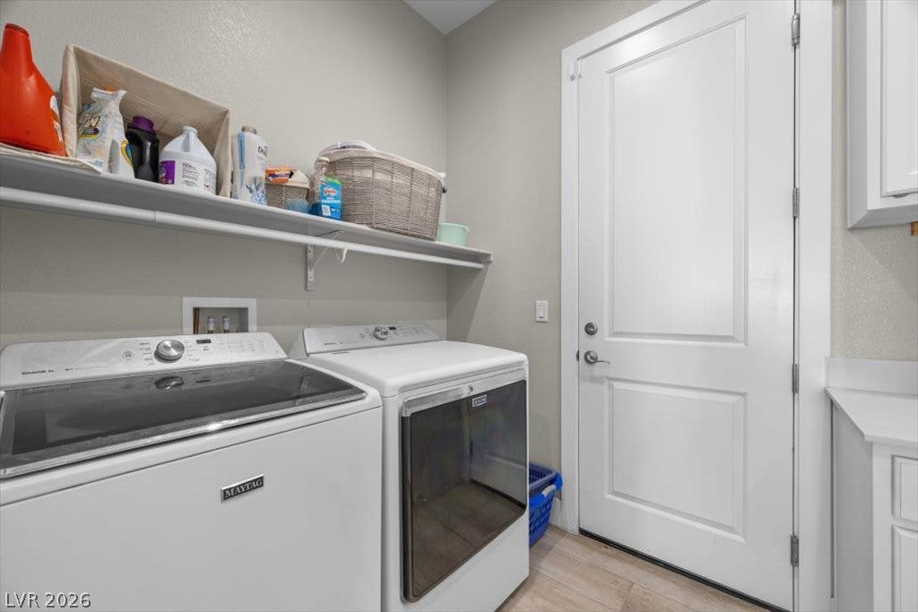 286 Besame Court, Las Vegas, NV 89138 An organized dedicated utility space features convenient overhead shelving and clean solid flooring.