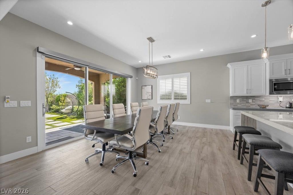 286 Besame Court, Las Vegas, NV 89138 Sliding glass doors connect this inviting dining space directly to the private backyard.