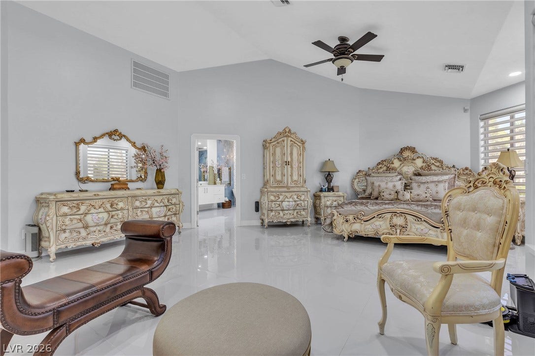 3341 Camino Gardens Way, Las Vegas, NV 89146 Gleaming tile floors and vaulted ceilings define this expansive bedroom suite.