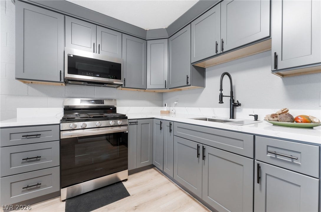 2515 Donna Street, #C, North Las Vegas, NV 89030 Sleek contemporary cabinetry pairs beautifully with elegant stone counters and stainless steel appliances.