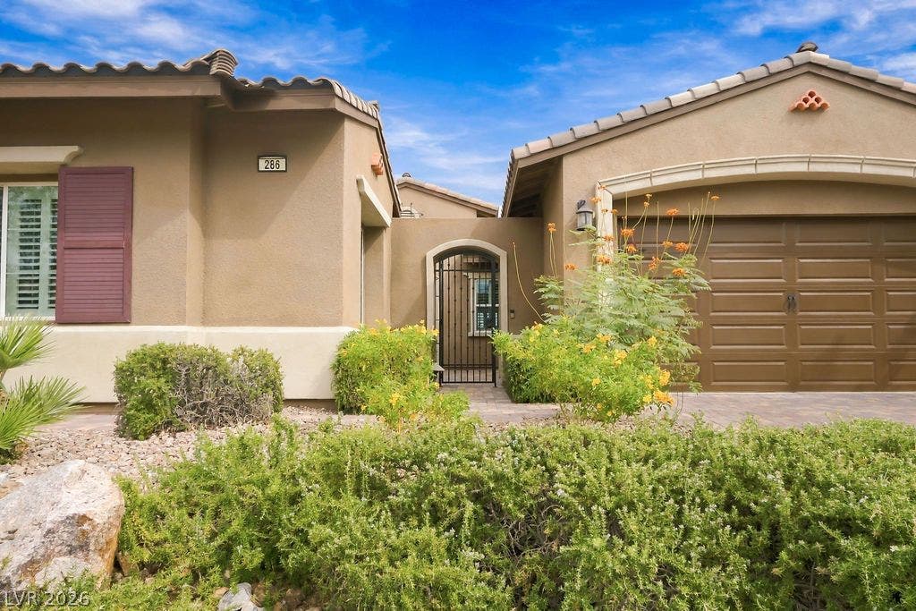 286 Lindura Court, Las Vegas, NV 89138 A gated courtyard entryway and attached garage.