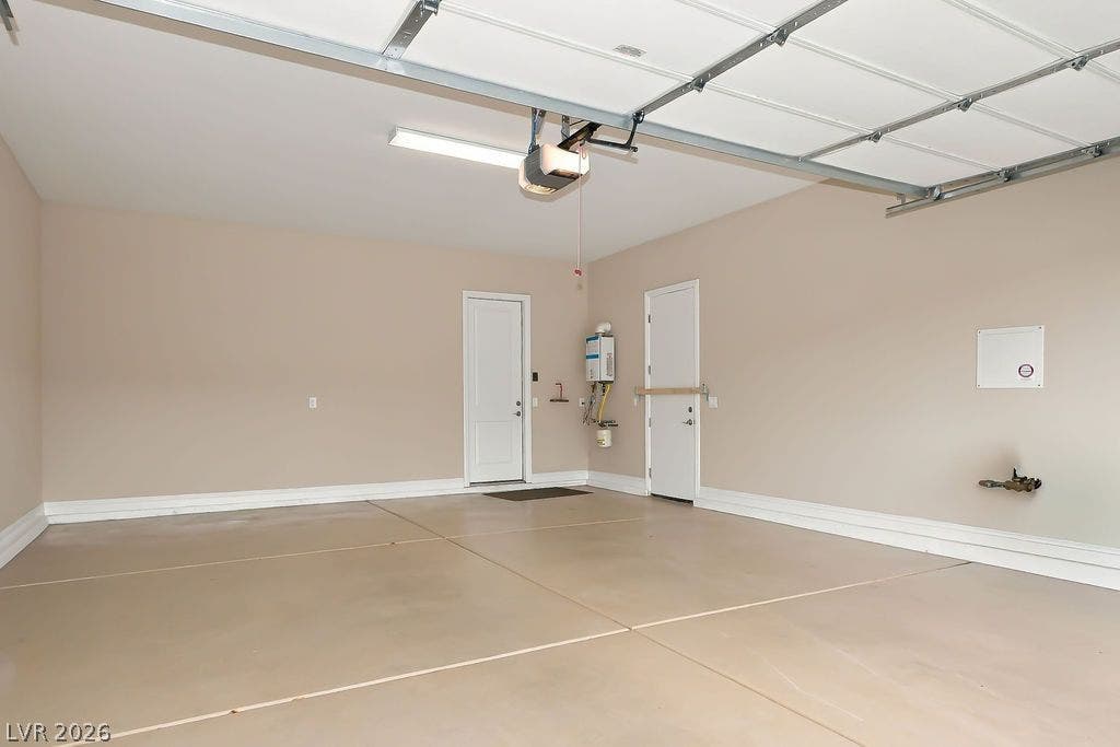 286 Lindura Court, Las Vegas, NV 89138 Smooth concrete floors and finished walls define this clean, spacious garage space.