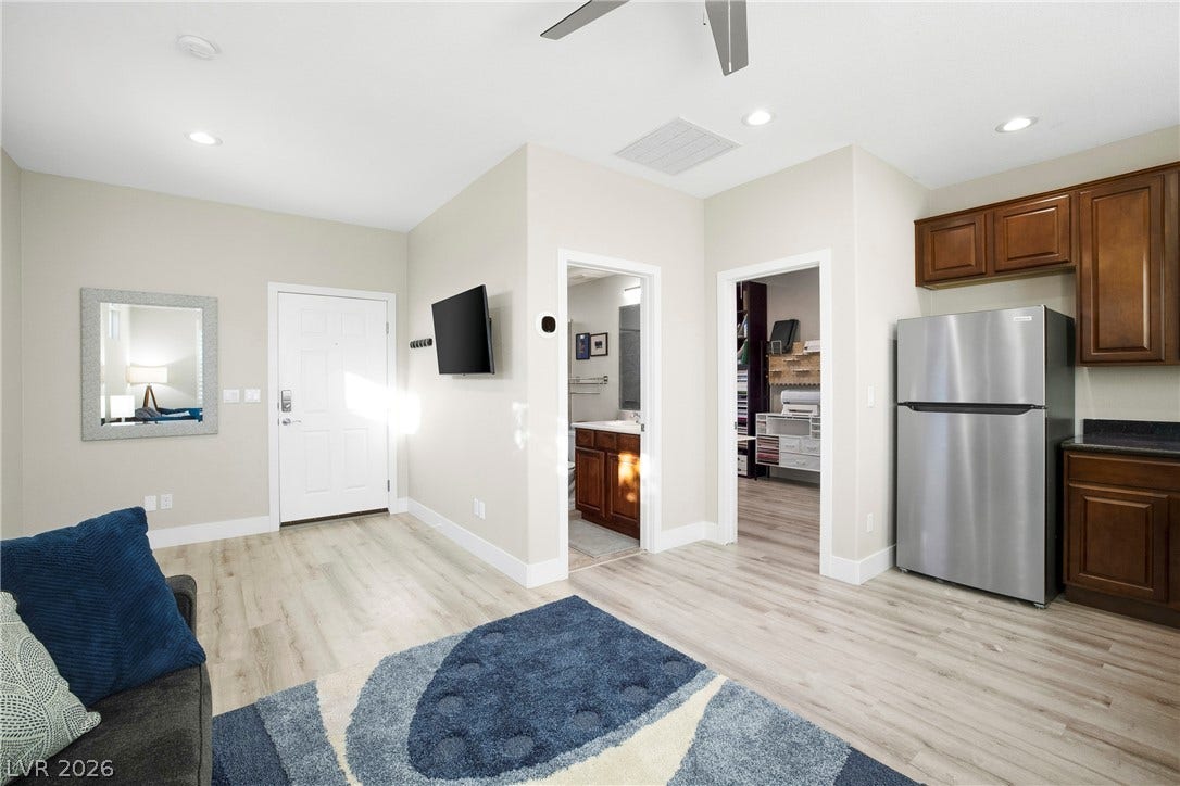 2432 Anderson Park Drive, Henderson, NV 89044 Smooth wood-look flooring connects this versatile open area to the adjacent kitchen and bathroom.