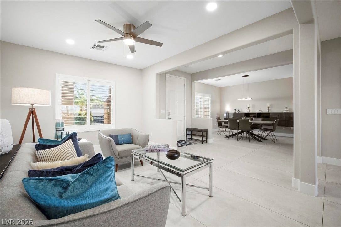2432 Anderson Park Drive, Henderson, NV 89044 An open floorplan design creates a seamless transition between the living and dining spaces.