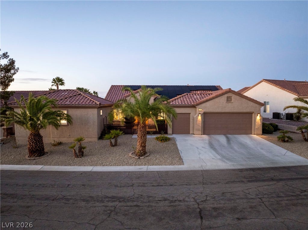 2432 Anderson Park Drive, Henderson, NV 89044 Desert landscaping and a tiled roof define the exterior character of this ranch-style home.