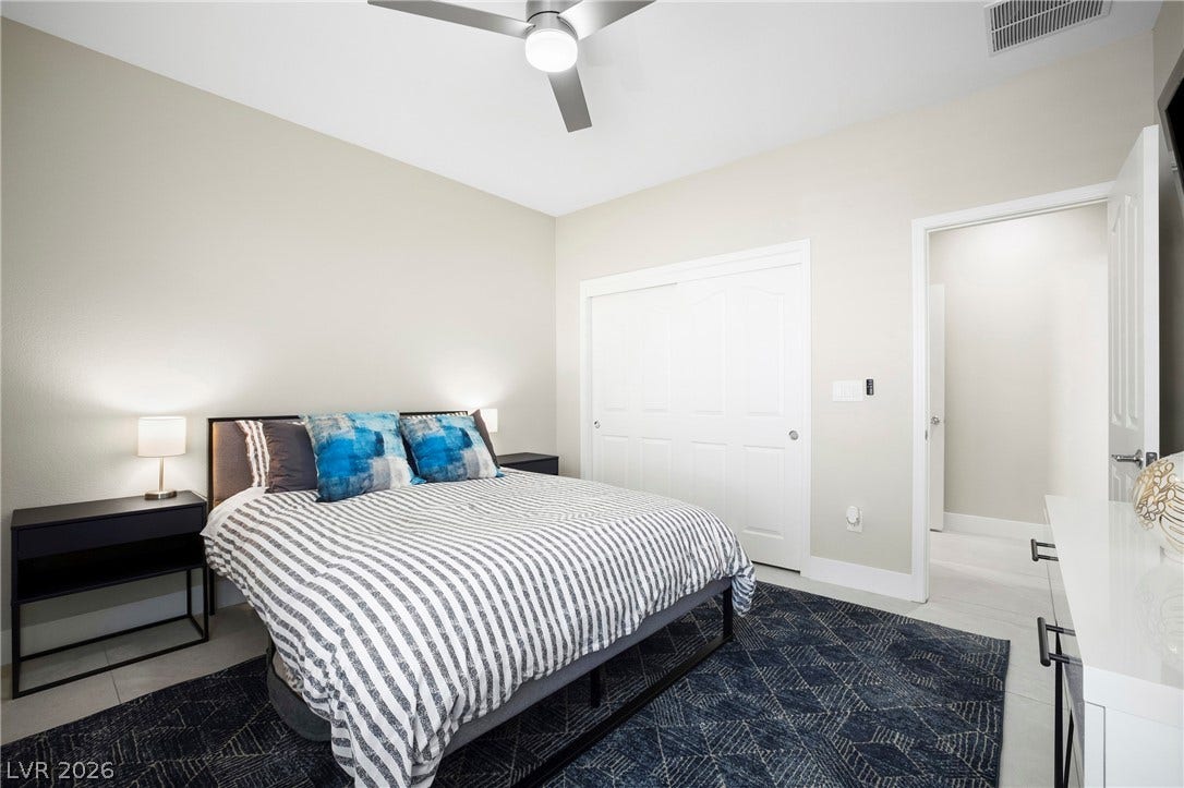 2432 Anderson Park Drive, Henderson, NV 89044 Smooth tile flooring and clean lines create a tranquil sleeping sanctuary.