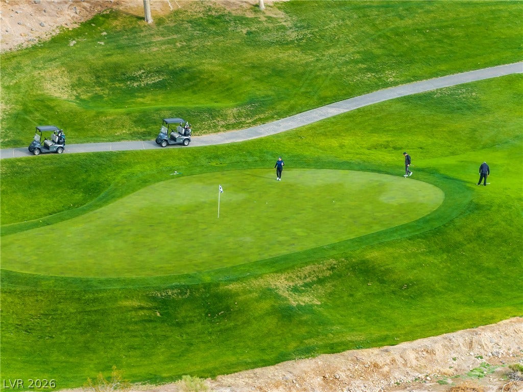 2432 Anderson Park Drive, Henderson, NV 89044 Lush fairways and a manicured green provide a scenic backdrop on the local course.