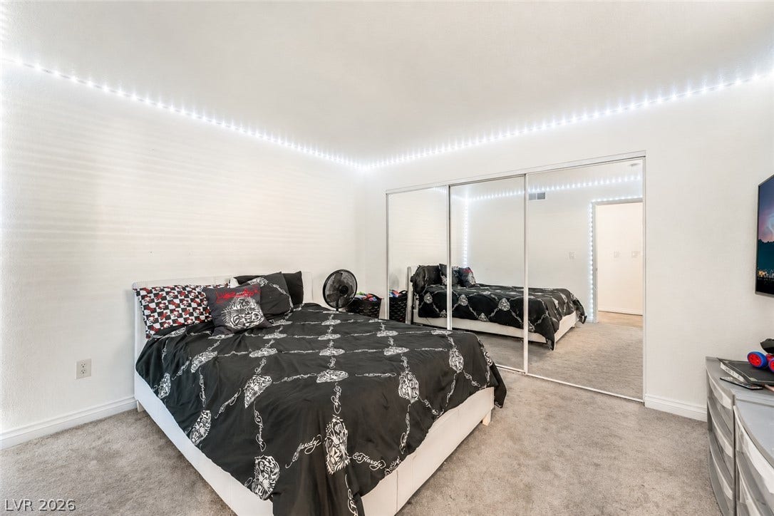 5055 W Hacienda Avenue, #1136, Las Vegas, NV 89118 Plush wall-to-wall carpeting and mirrored closet doors define this bright bedroom retreat.