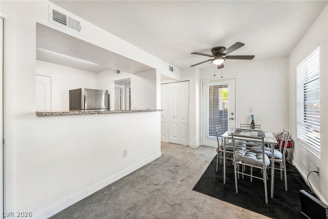 5055 W Hacienda Avenue, #1136, Las Vegas, NV 89118 Plush carpeting and an open breakfast bar connect this dining space directly to the kitchen.