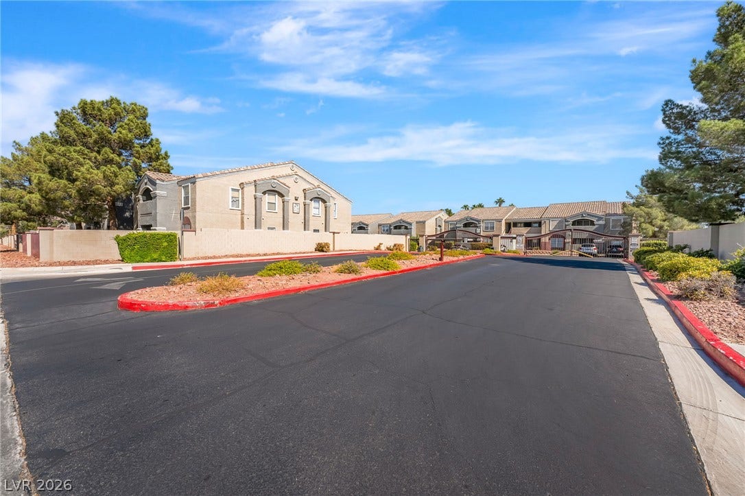 5055 W Hacienda Avenue, #1136, Las Vegas, NV 89118 A secure gated entrance leads into this beautifully maintained residential community with manicured landscaping.