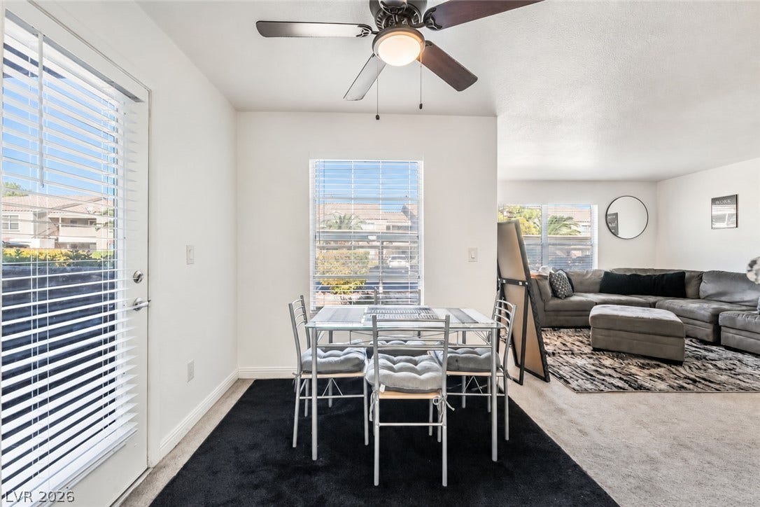 5055 W Hacienda Avenue, #1136, Las Vegas, NV 89118 An open layout connects the dedicated dining space directly to the main living area.