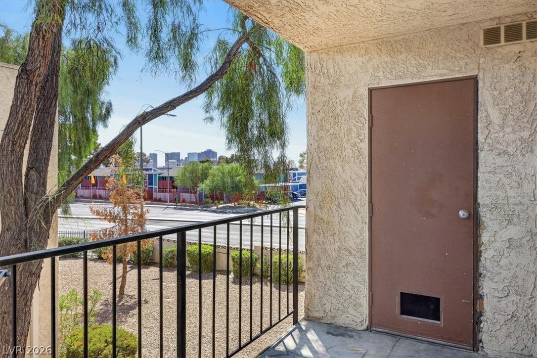4454 W Desert Inn Road, #D, Las Vegas, NV 89102 A private upper-level balcony overlooks the surrounding neighborhood.
