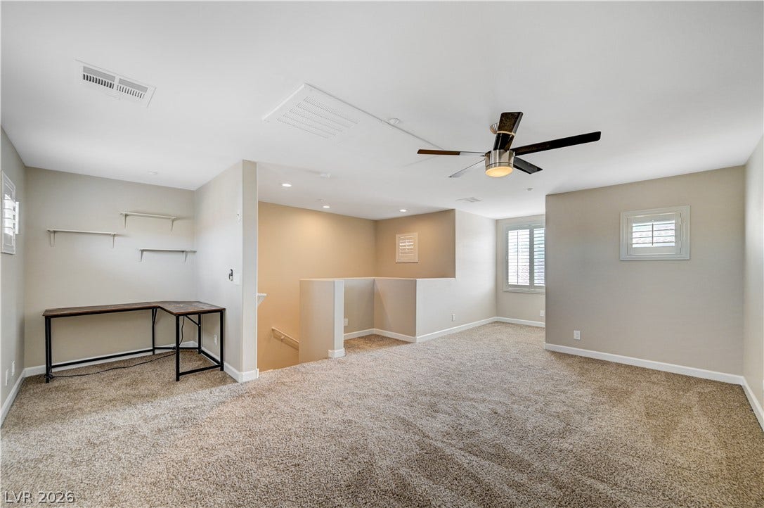 1525 Spiced Wine Avenue, #3105, Henderson, NV 89074 Plush carpeting and plantation shutters define this versatile upper-level bonus space.