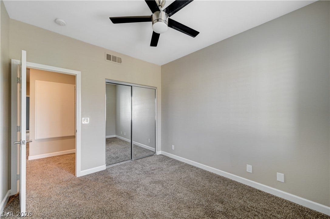 1525 Spiced Wine Avenue, #3105, Henderson, NV 89074 Soft carpeting pairs with neutral walls in this comfortable secondary bedroom.