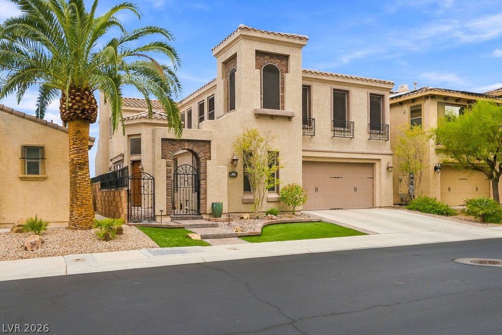 Distinctive Mediterranean architecture defines this elegant multi-level home on a quiet paved street.