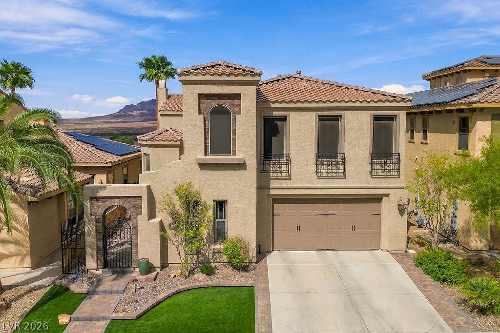 Mediterranean style architecture blends beautifully with the surrounding desert and mountain backdrop.