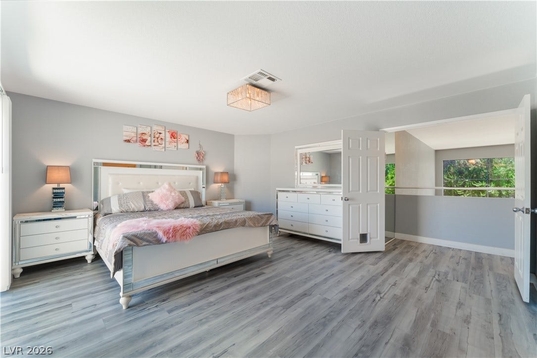 6250 W Flamingo Road, #37, Las Vegas, NV 89103 Relax in this tranquil bedroom, featuring sleek flooring and generous natural light.