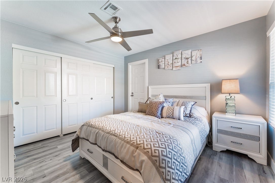 6250 W Flamingo Road, #37, Las Vegas, NV 89103 A well-appointed bedroom features ample closet space and durable vinyl plank flooring, offering both style and practicality.
