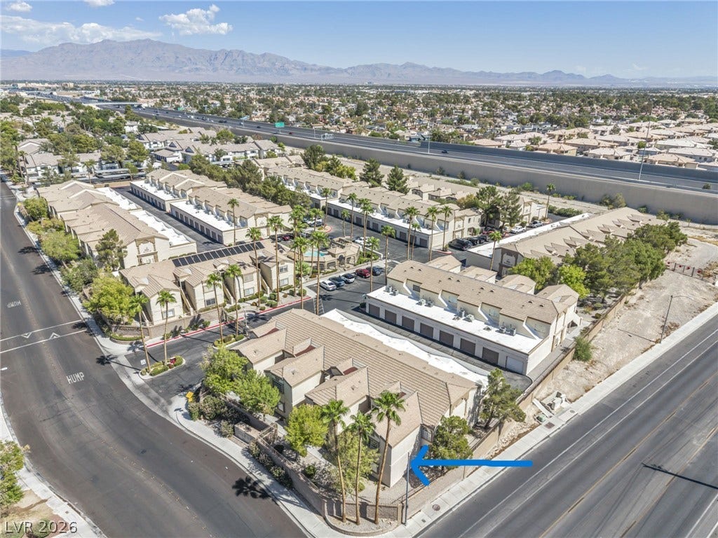 3613 Shawn Reynolds Court, #104, Las Vegas, NV 89129 Arrow marks location of unit. Mountain views from Primary bedroom.