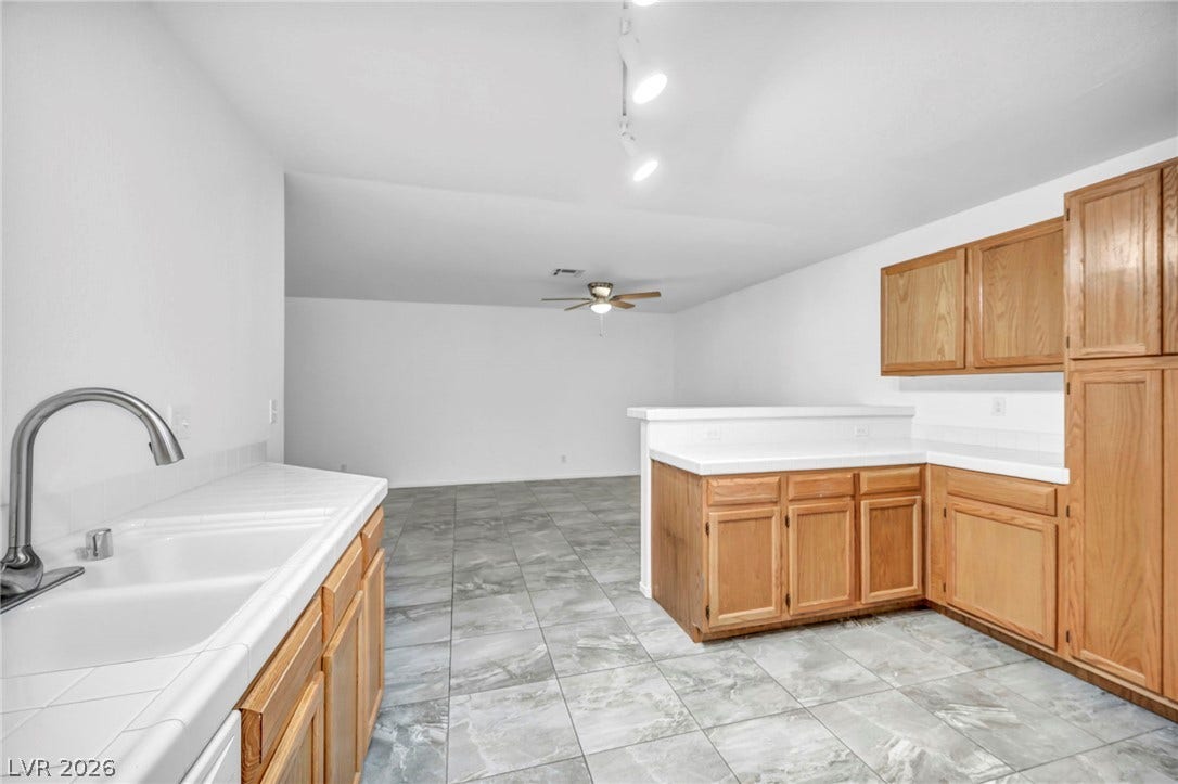 3613 Shawn Reynolds Court, #104, Las Vegas, NV 89129 Open to the adjacent dining area.