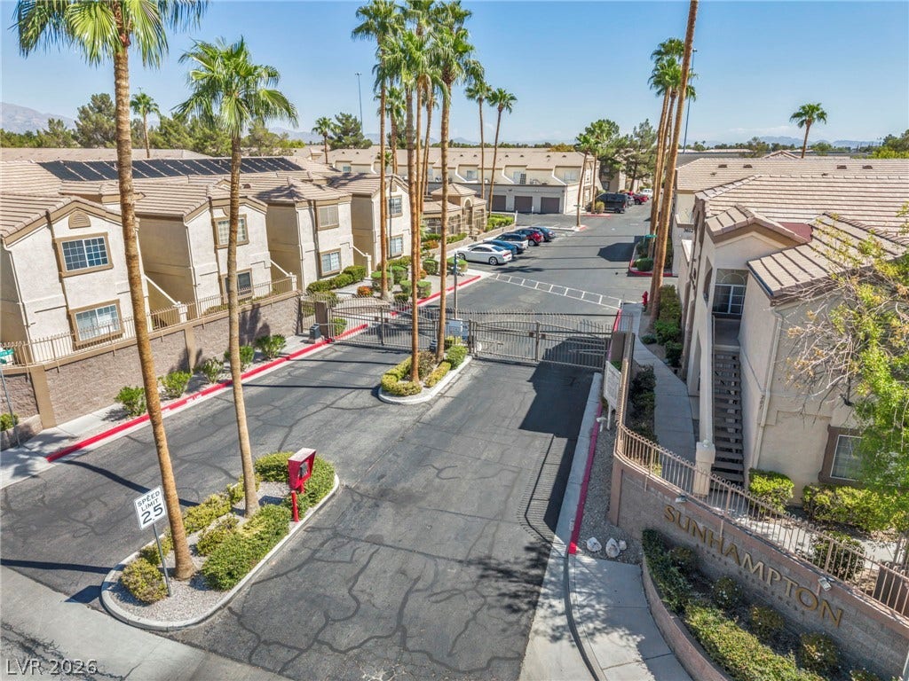 3613 Shawn Reynolds Court, #104, Las Vegas, NV 89129 Secure gated entry welcomes residents home to this manicured suburban townhome community.