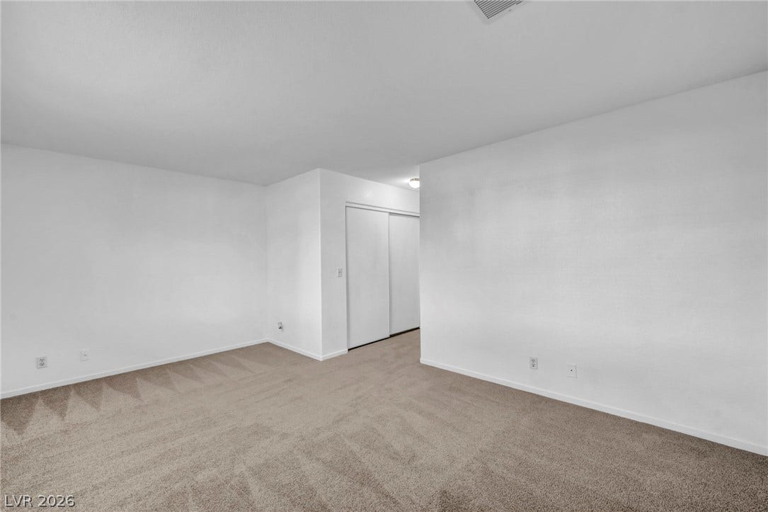 3613 Shawn Reynolds Court, #104, Las Vegas, NV 89129 Soft carpeting pairs with neutral walls in this versatile and spacious bedroom layout.