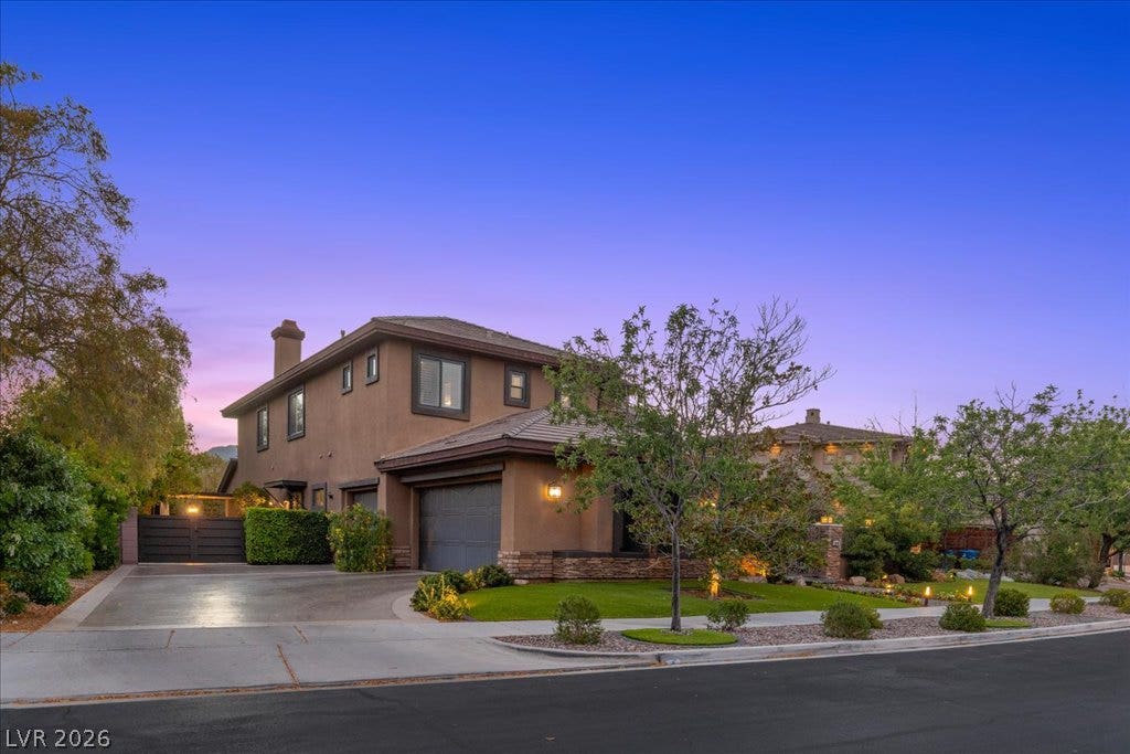 2985 American River Lane, Las Vegas, NV 89135 Elegant property surrounded by mature landscaping.