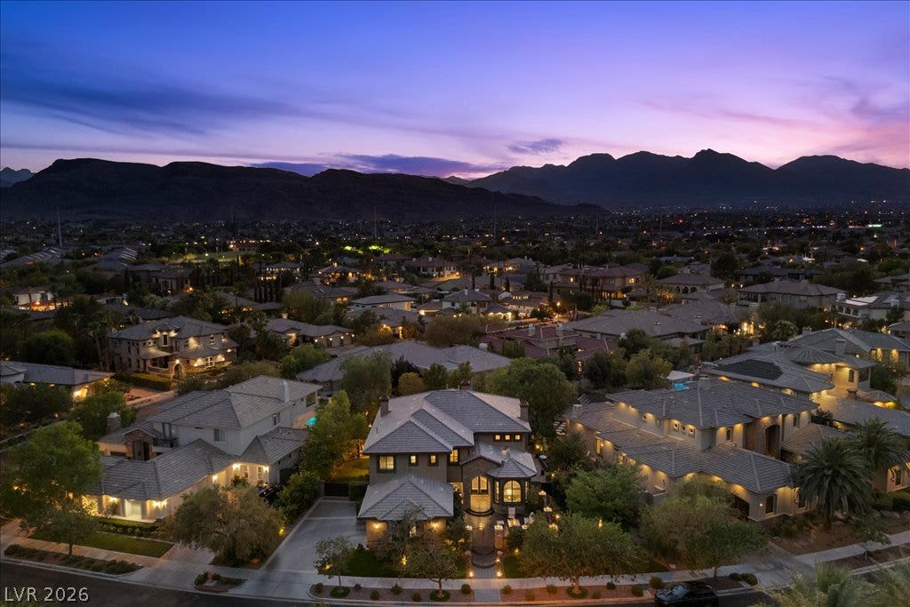 2985 American River Lane, Las Vegas, NV 89135 Aerial view of the neighborhood with mountain vistas.