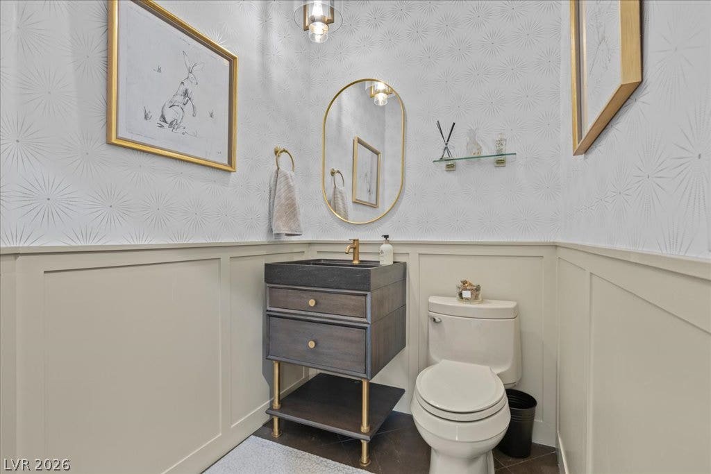 2985 American River Lane, Las Vegas, NV 89135 Beautiful powder room with classic wainscoting.