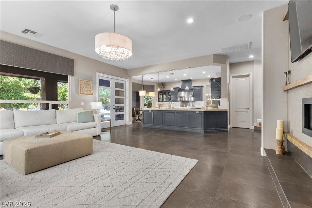 2985 American River Lane, Las Vegas, NV 89135 Spacious living room filled with natural light.