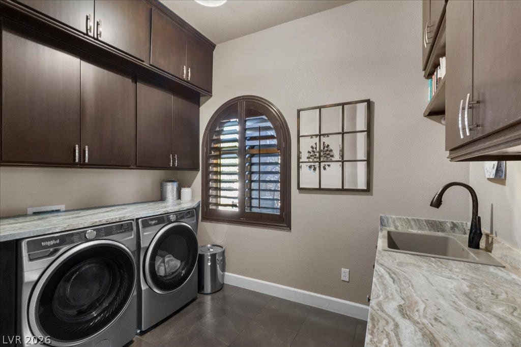 2985 American River Lane, Las Vegas, NV 89135 Spacious laundry room with sink and built-in storage.