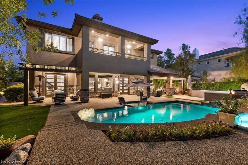 2985 American River Lane, Las Vegas, NV 89135 Relaxing backyard oasis centered around a glistening pool.