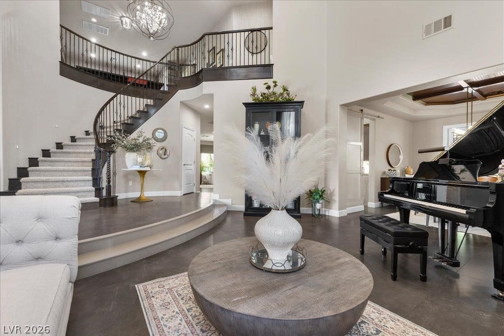 2985 American River Lane, Las Vegas, NV 89135 Welcoming entry with timeless elegance and rich finishes.