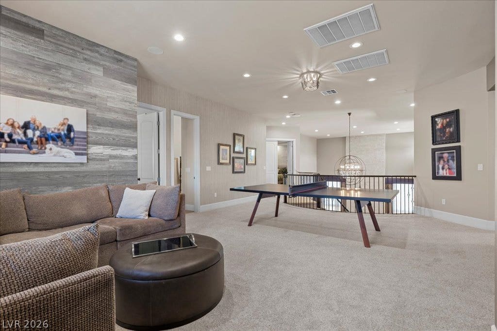 2985 American River Lane, Las Vegas, NV 89135 Open recreation room offers flexible space for leisure and entertainment.