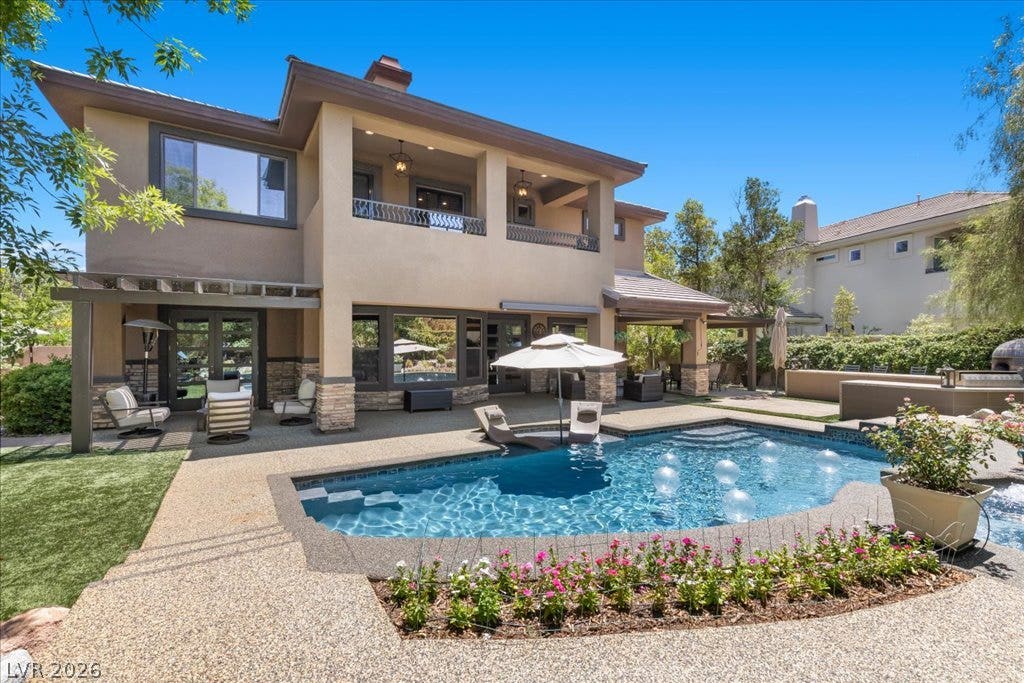 2985 American River Lane, Las Vegas, NV 89135 Poolside retreat ideal for leisure and relaxation.