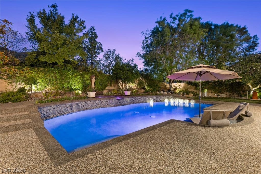 2985 American River Lane, Las Vegas, NV 89135 Shimmering pool creates an inviting evening oasis.