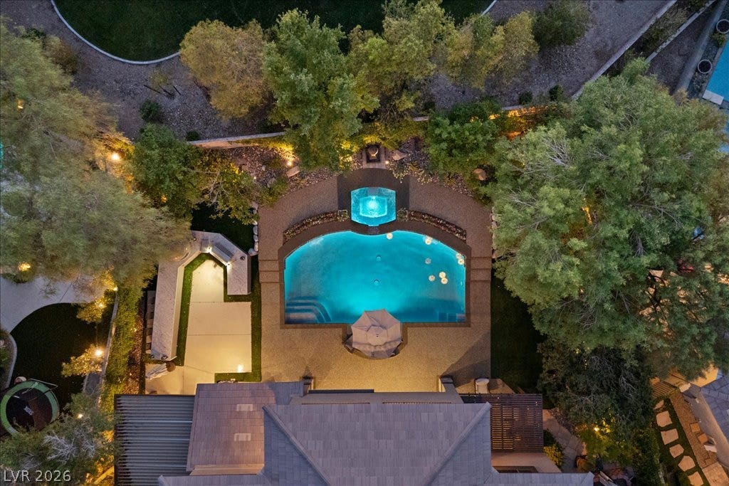2985 American River Lane, Las Vegas, NV 89135 Aerial view of the backyard pool and spa retreat.