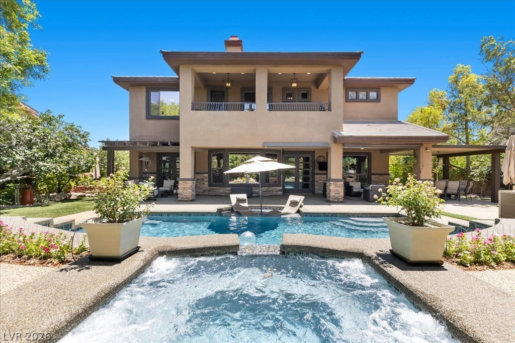 2985 American River Lane, Las Vegas, NV 89135 Sparkling pool and spa create the perfect backyard escape.