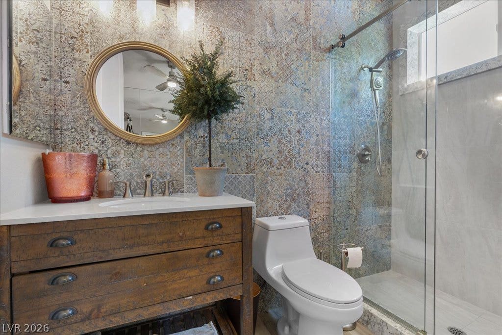 2985 American River Lane, Las Vegas, NV 89135 Beautiful bathroom with ornate tile accents.