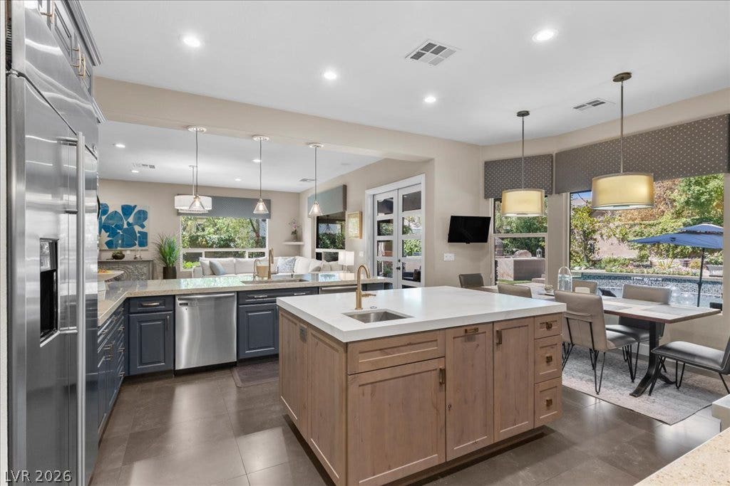 2985 American River Lane, Las Vegas, NV 89135 Chefs kitchen with spacious island and built-in appliances.