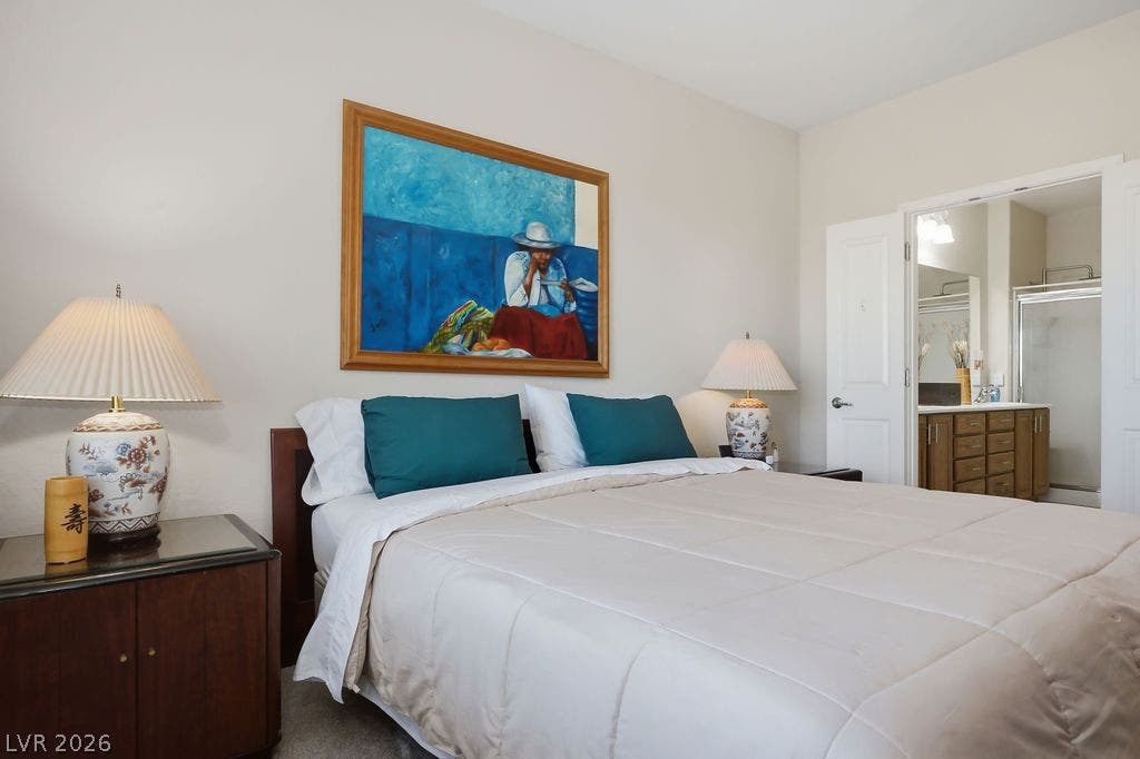 2510 Hamonah Drive, Henderson, NV 89044 An inviting bedroom space connects seamlessly to a private en suite bath.