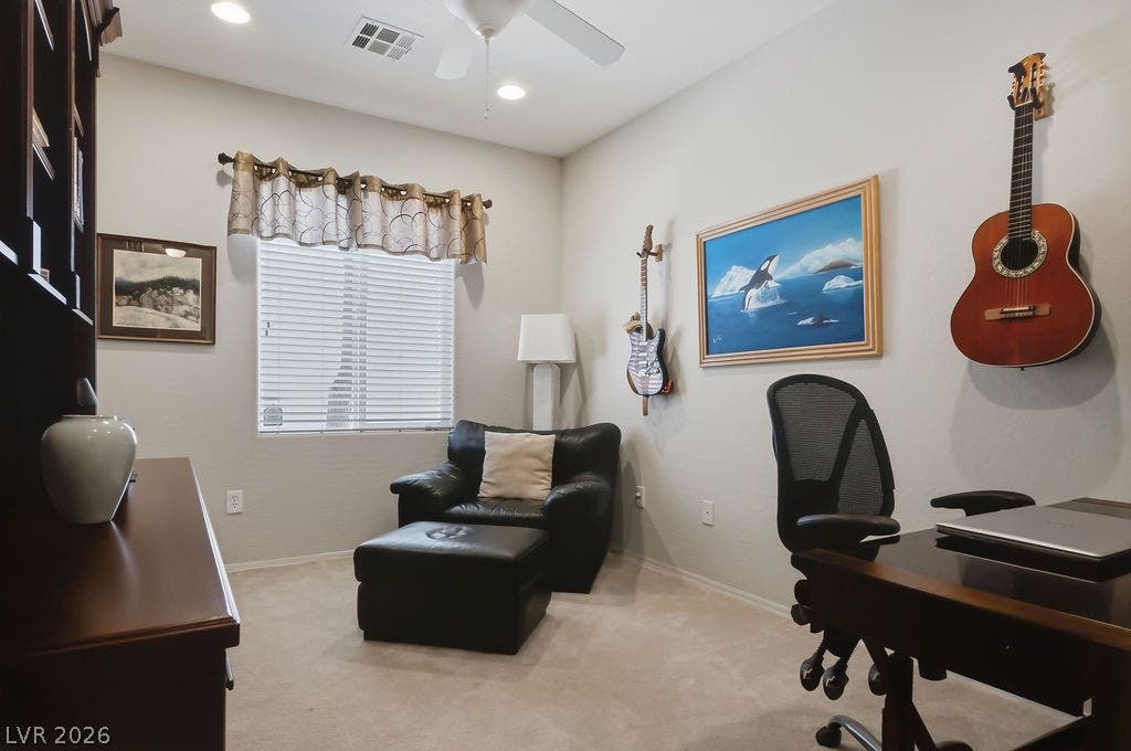 2510 Hamonah Drive, Henderson, NV 89044 Recessed lighting and soft carpeting create a comfortable atmosphere in this versatile home office.