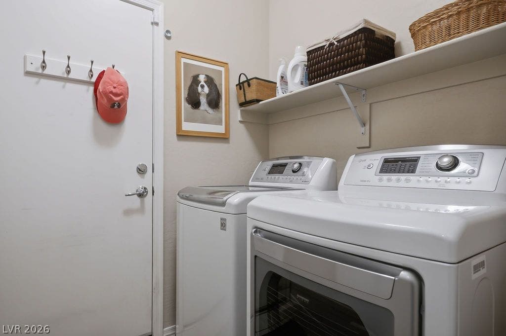 2510 Hamonah Drive, Henderson, NV 89044 Functional utility space features overhead shelving above the laundry appliances.