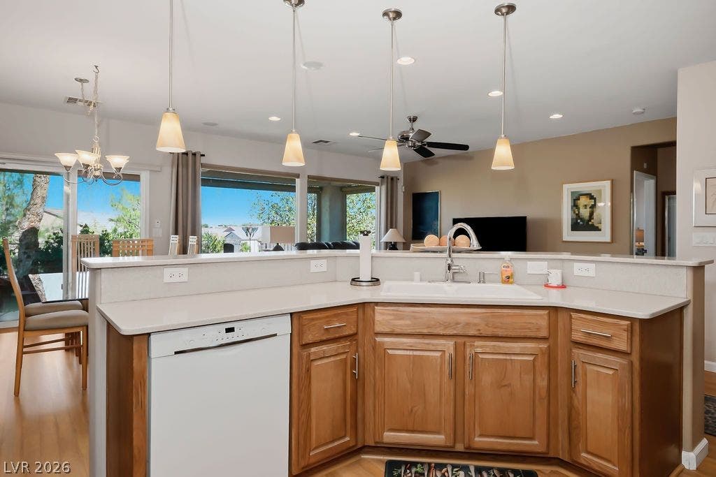 2510 Hamonah Drive, Henderson, NV 89044 Gleaming wood floors anchor an airy kitchen looking toward a spacious open living zone.