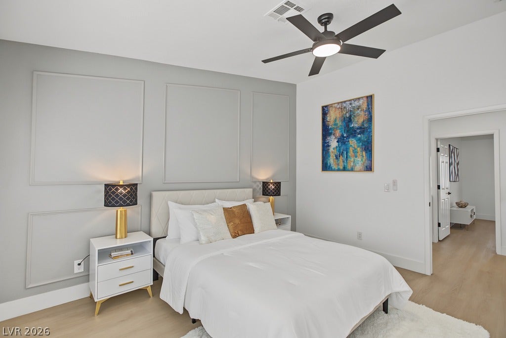 2371 Pickwick Drive, Henderson, NV 89014 Elegant wall molding adds refined architectural detail to this tranquil bedroom space.