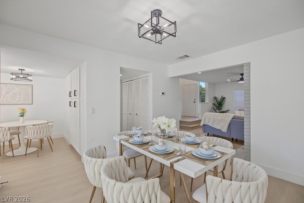 2371 Pickwick Drive, Henderson, NV 89014 Smooth wood floors flow throughout this bright, open dining area adjacent to the living spaces.
