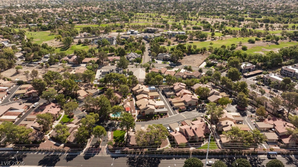 2371 Pickwick Drive, Henderson, NV 89014 An aerial perspective reveals a serene residential neighborhood bordered by a lush golf course.