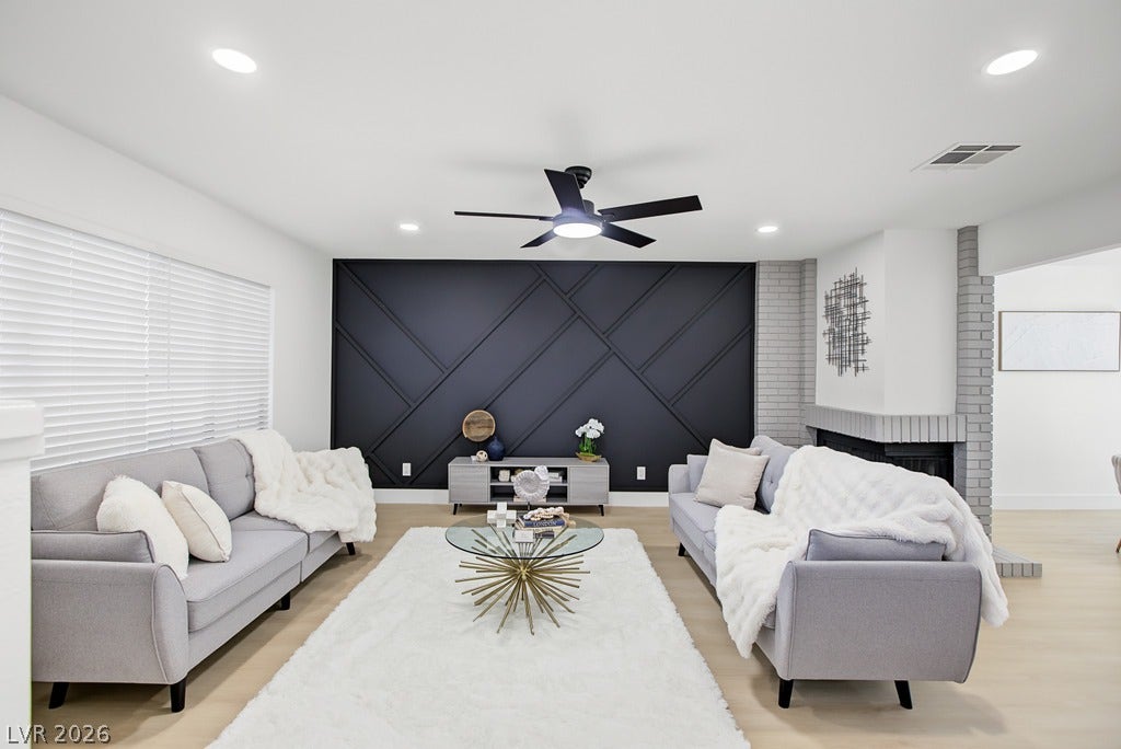 2371 Pickwick Drive, Henderson, NV 89014 Recessed lighting and light-toned flooring frame the welcoming living area.