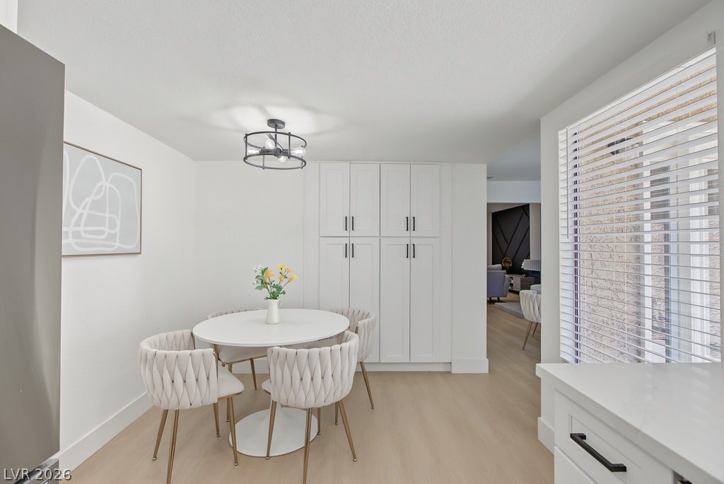 2371 Pickwick Drive, Henderson, NV 89014 Gleaming wood floors and customized built-in storage define this welcoming dining area.